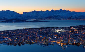 bird's eye view with night lights of Tromso, Norway. Harry Jaschhof@Unsplash