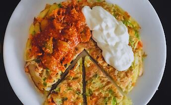 Chipsi Mayai, also known as Zege, A popular dish in Tanzania, Kilimanjaro, Tanzania. iamkevoo@Wikimedia Commons