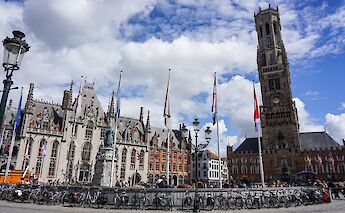Bikes parked in Brug Square, Bruges, Belgium. Michael Magaao@Unsplash