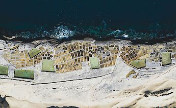 Salt pans from above, Gozo, Malta. Karl Paul Baldacchino@Unsplash