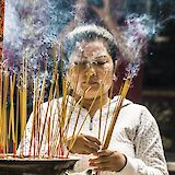 Culture in display, Incense burning by a local in Ho Chi Minh City, Vietnam. Guille Alvarez@Unsplash