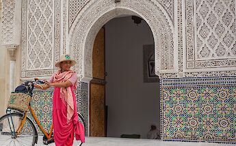 Local woman with bike, Marrakesh, Morocco. CC:Sarah Holmberg
