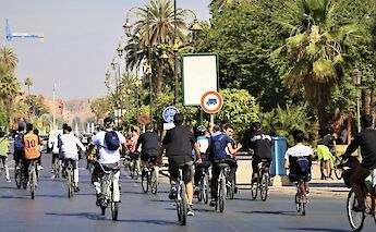 Cycling through town, Morocco. CC:Pikala Bikes