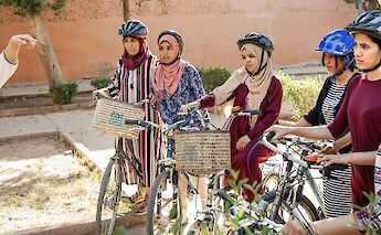 Listening to the tour guide, Morocco. CC:Pikala Bikes