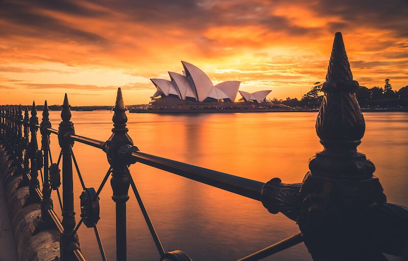 A stunning sunrise, captured behind the famous Sydney Opera House, Circular Quay, Sydney, Australia. Liam Pozz@Unsplash