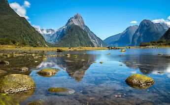 Stones in a lake in New Zealand. Unsplash@Getty Images