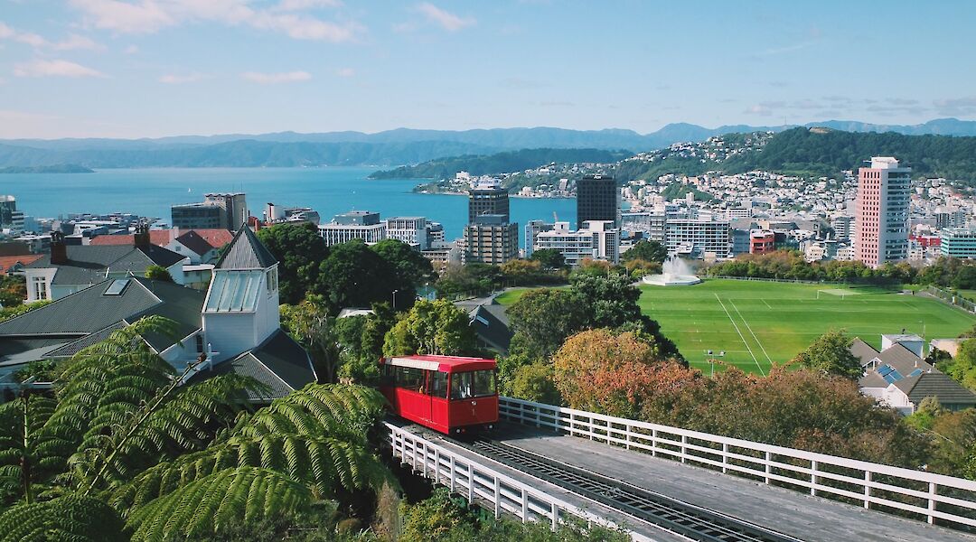 uphill tram in the middle of a beautiful landscape in Wellington, New Zealand. Joao Marcelo Martins@Unsplash
