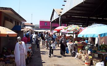 Market Scene in Moshi, Tanzania. Dan Vogel@Wikimedia Commons
