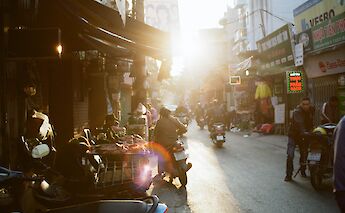Motorbikes used widely by locals in the streets of Hanoi, Vietnam. Manh Nghiem@Unsplash