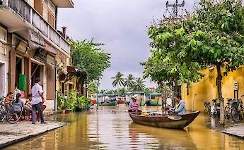 Boat next to a house in Hoi An, Vietnam. Toomas Tartes@Unsplash