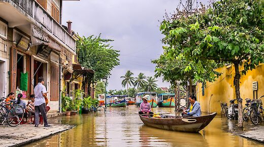 Boat next to a house in Hoi An, Vietnam. Toomas Tartes@Unsplash