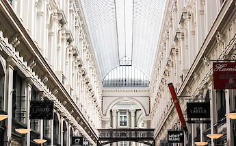 Glass roof and beautiful architecture in a shopping center in the Hague, Holland. Micheile Henderson@Unsplash