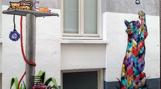 Cats on the wall, Street Art in The Hague, holand. FredTC@Wikimedia Commons
