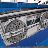 Stereo Graffiti by Eindhoven, Street art in the Hague, Holland. FaceMePLS@Wikimedia Commons