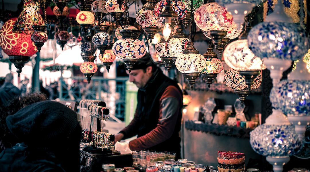 Local Merchant behind the counter, Istanbul, Turkey. Wei Pan@Unsplash