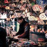 Local Merchant behind the counter, Istanbul, Turkey. Wei Pan@Unsplash