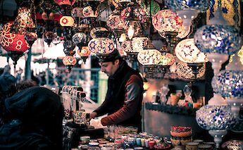Local Merchant behind the counter, Istanbul, Turkey. Wei Pan@Unsplash