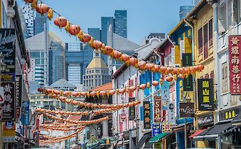 Festive lanterns over the streets in Chinatown, Singapore, Singapore. Adrian Jakob@Unsplash