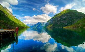 Reflections of the hills on the lake, hellesylt, Norway. Avery Ng@Flickr