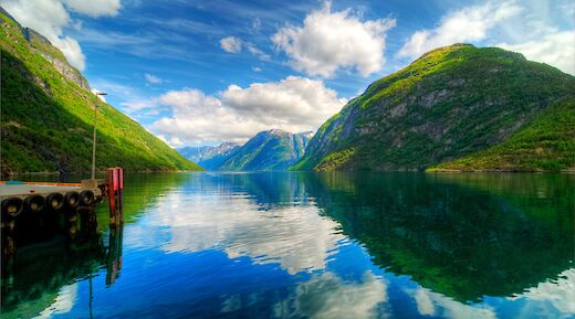 Reflections of the hills on the lake, hellesylt, Norway. Avery Ng@Flickr