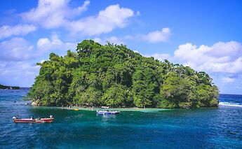 Motor boats by the island, Blue Lagoon, Port Antonio, Jamaica. Paul Mathew@Unsplash