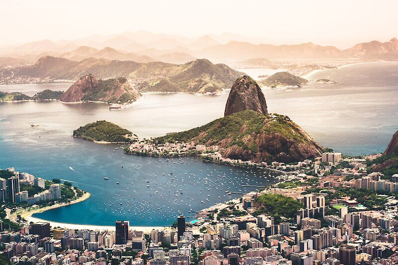 Aerial view, where the sea, mountains, and high rises meet, Brazil.  Agustin Diaz Gargiulo@Unsplash