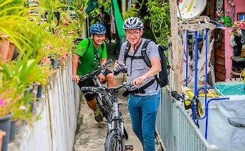Bikers on a footpath, Bangkok, Thailand. Grasshopper Day tours
