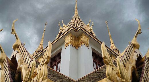 Storm clouds above a temple, Bangkok, Thailand. Markus Winkler@Unsplash