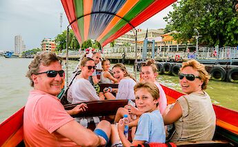 Boat ride through the canal, Bangkok, Thailand. Grasshopper Day Tours