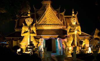 Beeautiful temple facade at night, Bangkok, Thailand. Grasshopper Day Tours