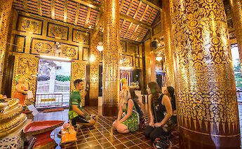 Tour lecture at a temple, Chiang Mai, Thailand. Grasshopper Day Tours