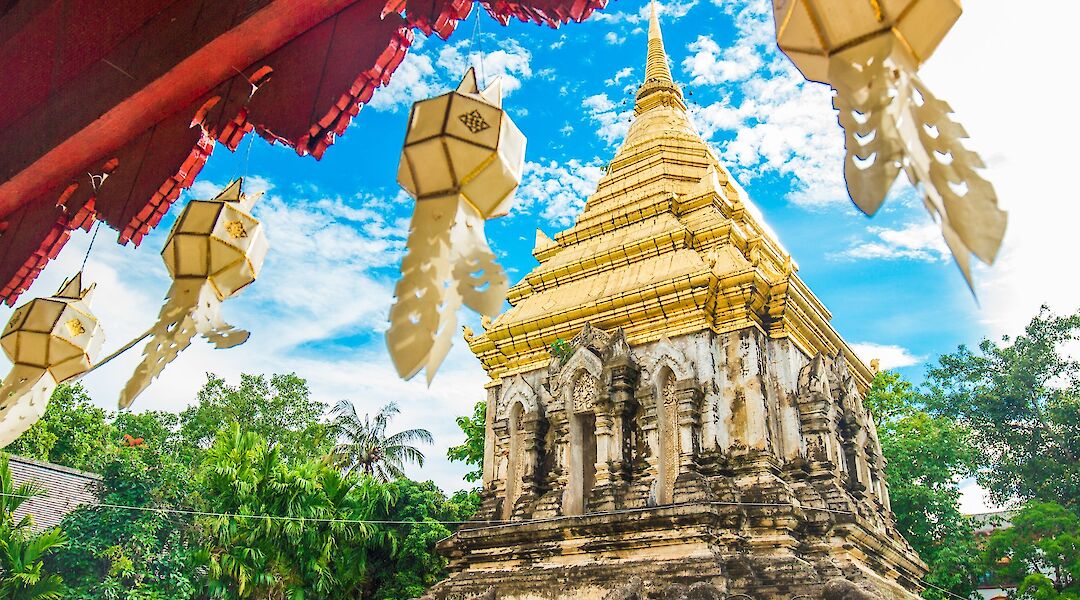 Blue skies and lanterns, Goldne Temple, Chiang Mai, Thailand. Cheese Yang@Unsplash