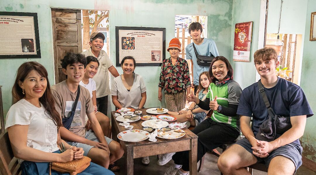 Enjoying local cuisine at Hoi An, Vietnam. Grasshopper Day Tours