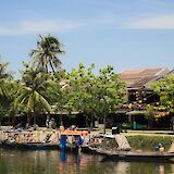 Fishing boats docked by the riverbank, Thu Bon River, Hoi An, Vietnam.  Aiph Doan@Unsplash