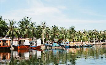 Colorful boats on the Thu Bon River, Hoi an, Vietnam. Z E@Unsplash