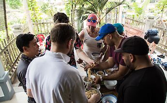 Enjoying local cuisine in Hoi An, Vietnam. Grasshopper Day Tours