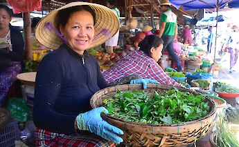 Local selling produce in Hoi An, Vietnam. Grasshopper Day Tours