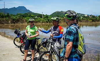 Learning about the local sites in Hoi An, Vietnam. Grasshopper Day Tours