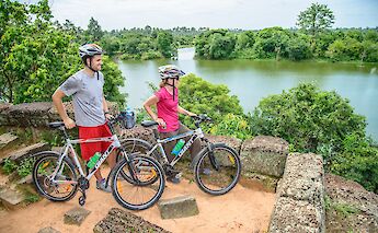 Enjoying Angkor Sunrise view, Siem Reap, Cambodia. Grasshopper Day Tours
