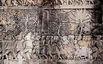 Old folklore and history in bas-relief carvings on the wall of Angkor Wat, Siem Reap, Cambodia. Graphic Node@Unsplash