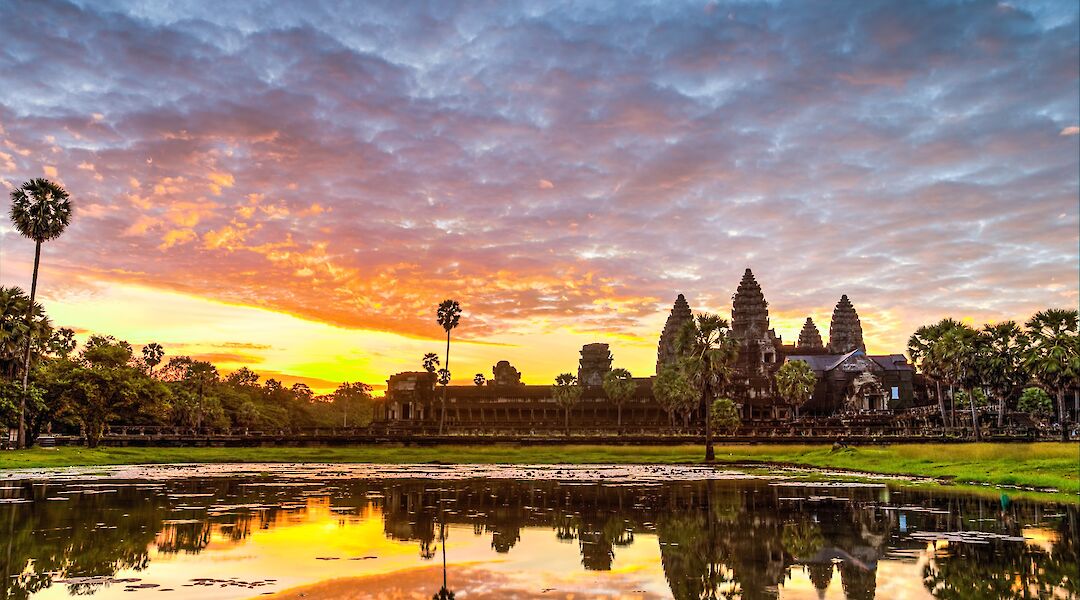 Panoramic sunrise view at the Angkor Temples, Siem Reap, Cambodia. Grasshopper Day Tours