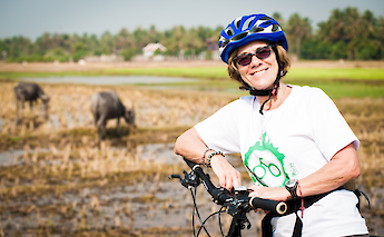 Striking a pose by the fields, Siem Reap, Cambodia. Grasshopper Day Tours