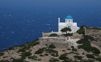 The Monastery of Taxiarches, gleaming above the Aegean. -toIH