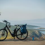 Pausing along the panoramic coastal route with stunning Aegean vistas. -toIH