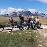 Stopping for briefing with mountains in the background, Sinjajevina, Zabljak, Montenegro. Durmitor Adventure Tours