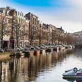 Boats along a canal in Amsterdam, Holland. r.schwartzkopf@Flickr