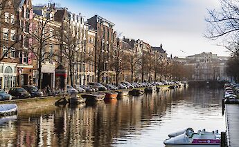 Boats along a canal in Amsterdam, Holland. r.schwartzkopf@Flickr