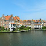 Buildings by the water in Enkhuizen, Holland. Ruben Holthuijsen@Flickr