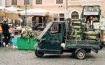 Tricycle carrying produce at Campo de Fiori, Rome, Italy. Gabriella Clare Marino@Unsplash