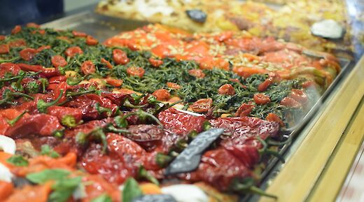 Pizza shop, Rome, Italy. Sarahcreates@Unsplash